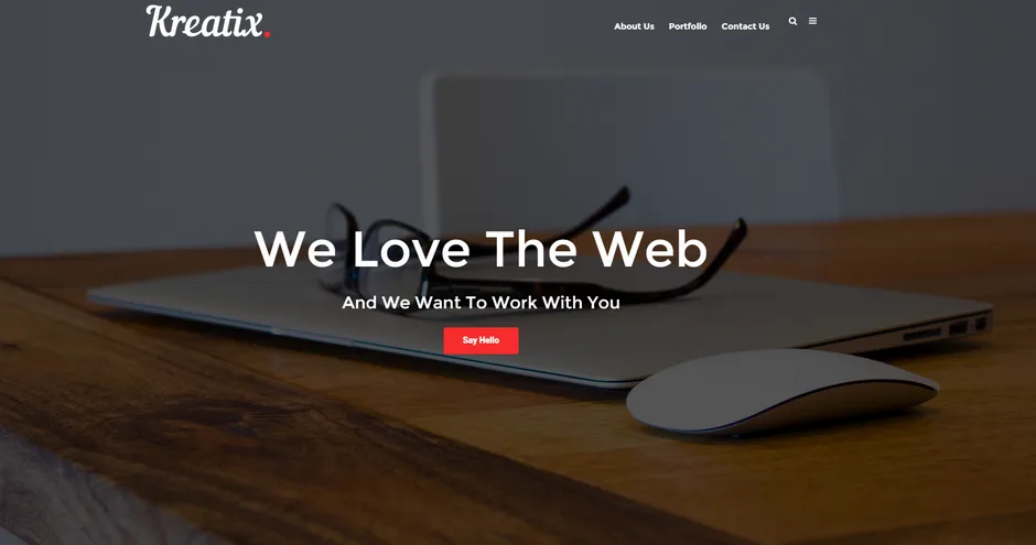 Dark landing page with a desk photo and the headline "We Love The Web".