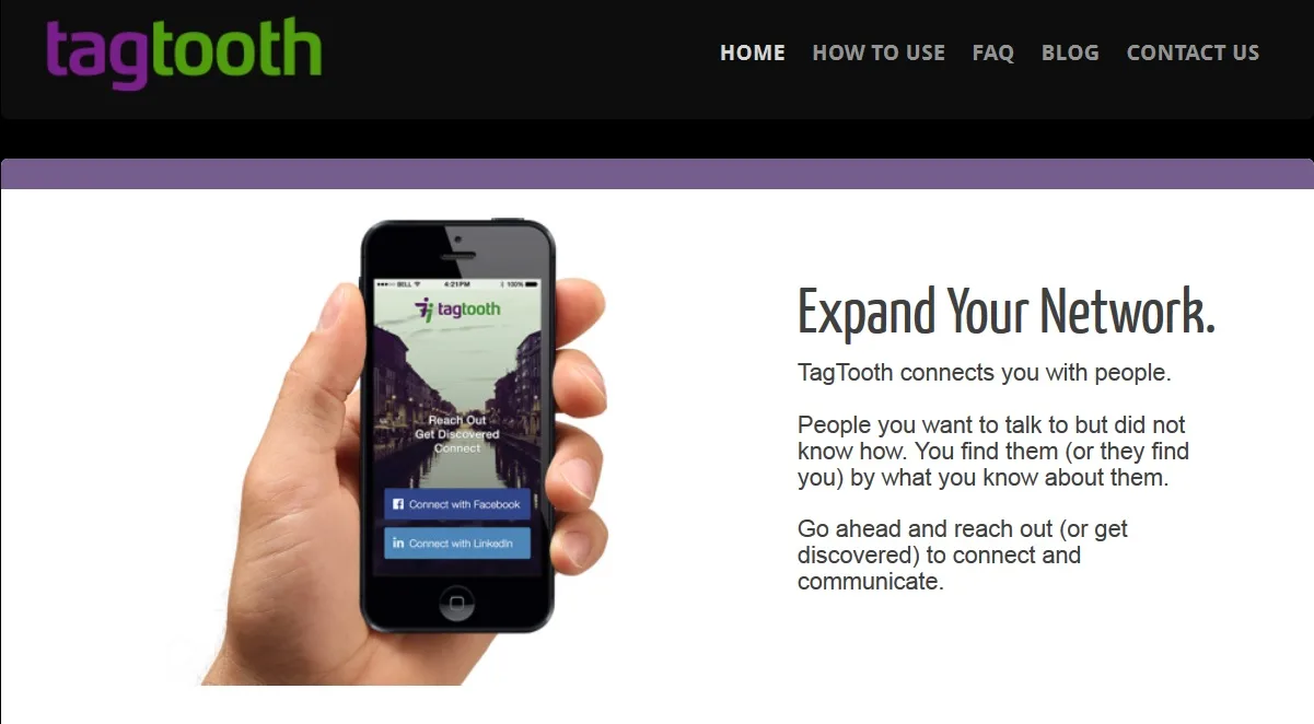 Homepage 'Expand Your Network.' with a hand holding an iPhone.