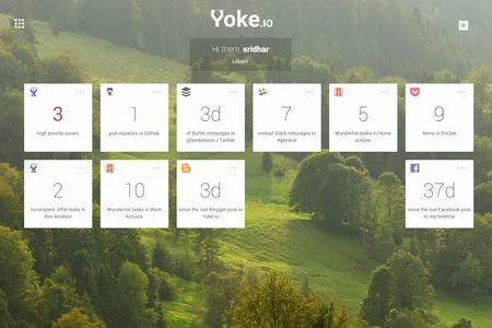 Dashboard 'Yoke.io' with notification count tiles over a forest background.