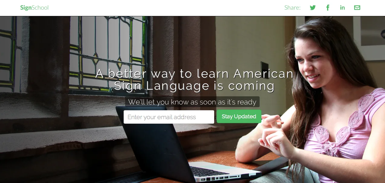 Landing page 'A better way to learn American Sign Language is coming' with a young woman at a laptop.