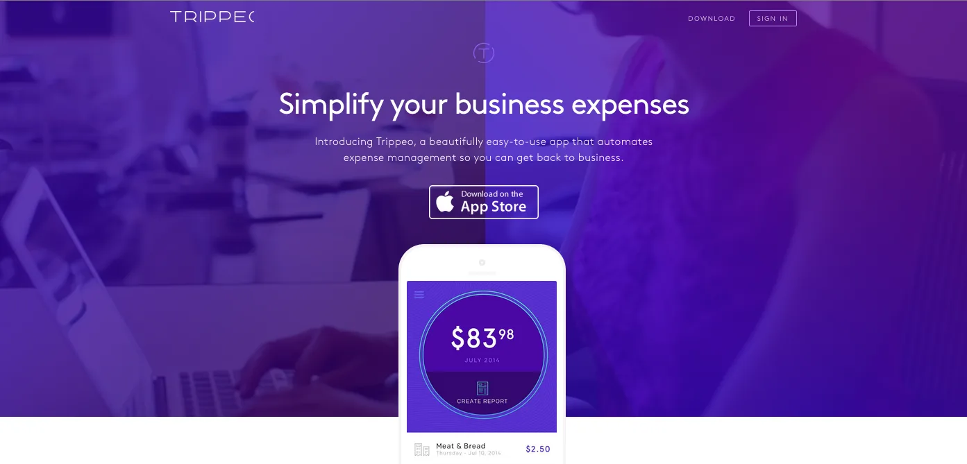 Purple homepage 'Simplify your business expenses' with a phone showing $83.