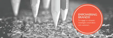 Grayscale photo of pencil tips with a red circle 'Empowering brands!'.