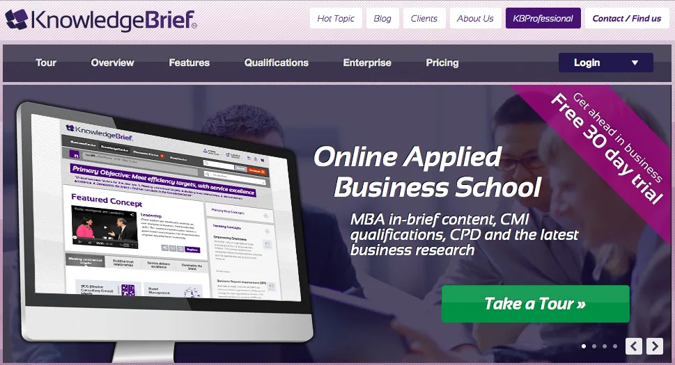 Landing page with an iMac showing course pages, headlined "Online Applied Business School", with a free trial ribbon.