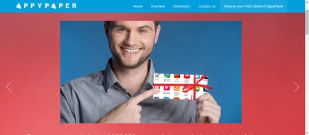 APPYPAPER page with a red hero photo of a smiling man holding a card.