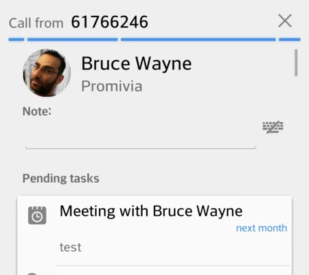 Mobile call screen showing a caller card with a photo, a note field and pending tasks.
