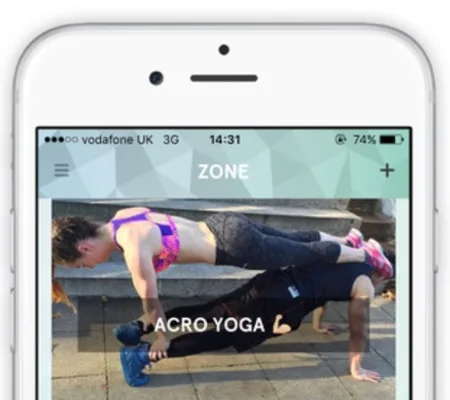 IPhone showing the ZONE app with a photo of two people doing acro yoga.
