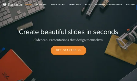Homepage 'Create beautiful slides in seconds' over a desk photo with keyboard and notebook.