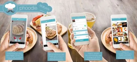 Four phones on a wooden table showing food app screens beside the phoodie logo.